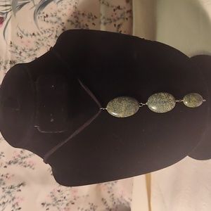 Leather necklace,3 coral stones,silver wire,11 inches long, it stretches